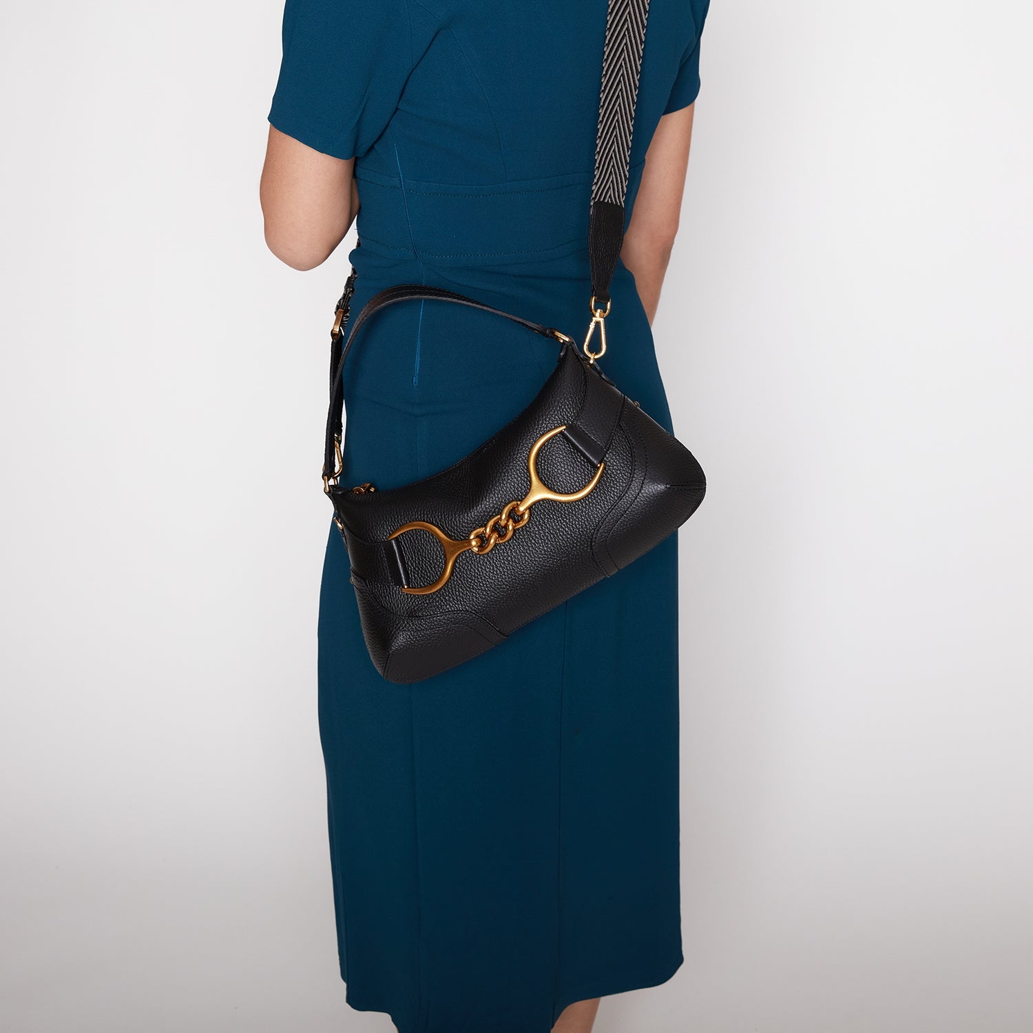 BLACK BOREAL SHOULDER BAG WITH GOLDEN ACCESSORY